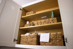 How to Maintain an Organized Home Long-Term Organized Kitchen Cabinet with Wicker Baskets