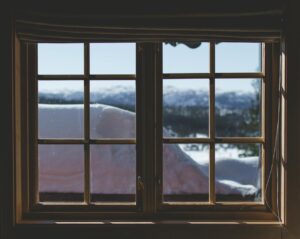 How to Clean Windows Without Streaks Two Brown Wooden Framed 6-lite Window Panes