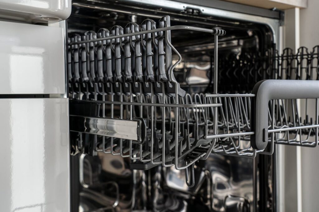 Close-up Photo of Empty Dishwasher