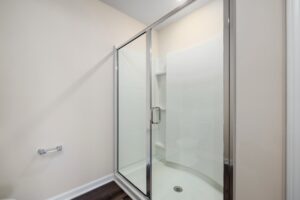 Clean Spacious Shower Room with Sliding Door