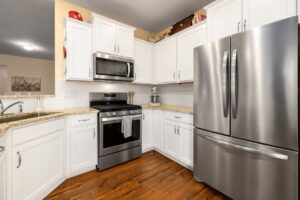How to Clean Stainless Steel Appliances Properly Stainless Steel Two Door Fridge on a Kitchen