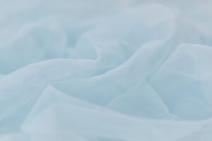 How to Wash Delicate Fabrics Safely Baby Blue Textile in Close Up Photography