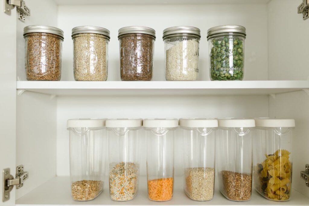 Dry Goods in Glass Containers on a Shelf