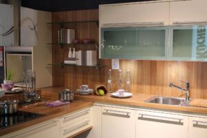 Nightly kitchen reset routine with clean countertops, organized dishes, and a tidy sink area
