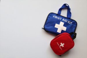 How to Create a Basic First Aid Station at Home Two first aid kits on a white background with ample copy space.